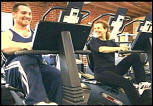 celebrity personal trainer Los Angeles on recumbent bike with client